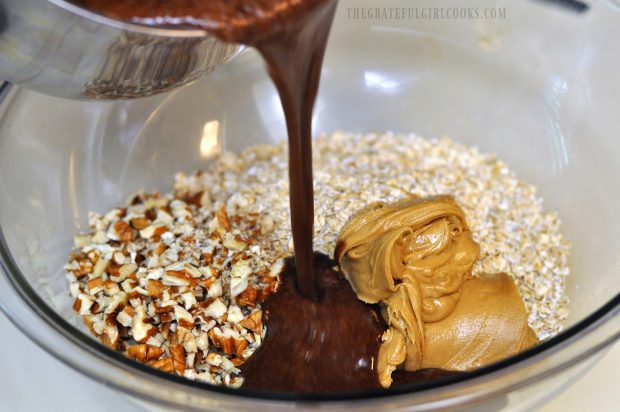 Hot cocoa mixture poured over peanut butter, oats and nuts.