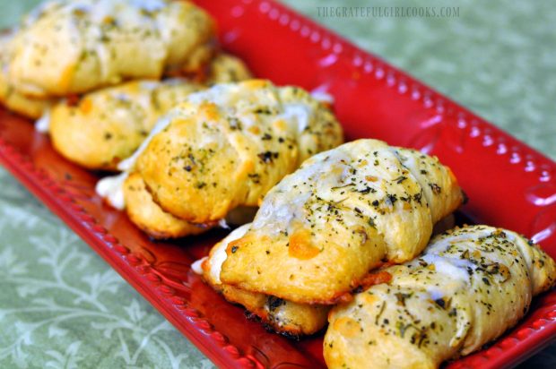 Easy Cheesy Garlic Crescent Rolls, served warm, on a red platter.