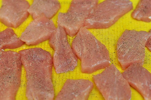 Pork medallions are lightly seasoned with salt, pepper.