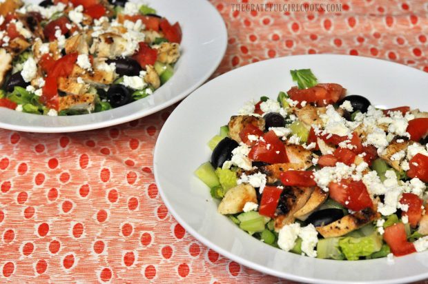Two chopped Greek chicken salads, in bowls, and ready for salad dressing!