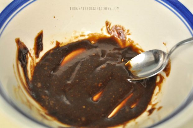 The ingredients for the hoisin glaze for the cod are mixed in a small bowl.