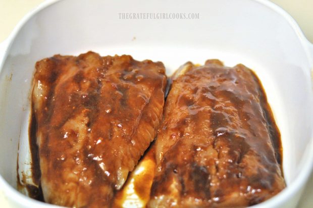 Cod with hoisin glaze is baked in a single layer in baking dish.