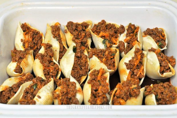 Mexican Stuffed Pasta Shells are arranged in dish before baking.