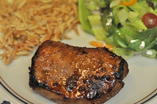 Honey garlic pork chops served with salad and toasted orzo side dish.