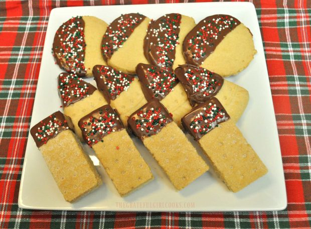 Chocolate Dipped Shortbread Cookies on a white serving plate, ready to eat!