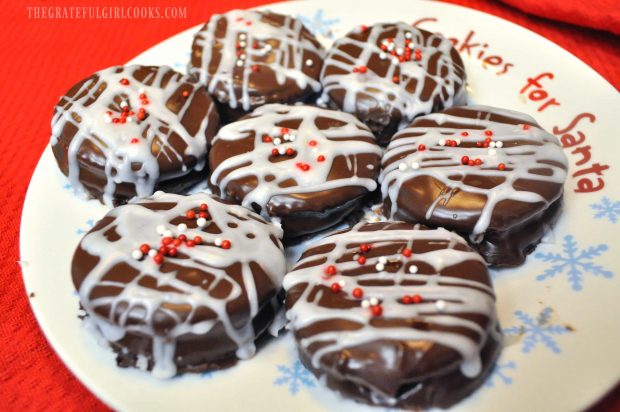 Chocolate Covered Peanut Butter Ritz Cookies on a Christmas plate.
