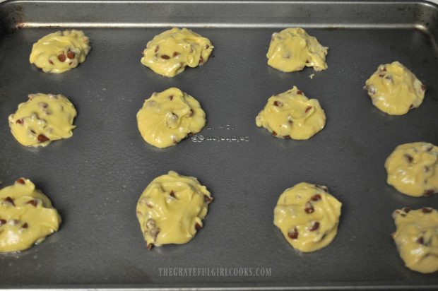 The dough for cinnamon chip cookies is placed in scoops onto baking sheet.