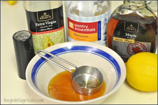 Ingredients ready to make creamy lemon salad dressing.