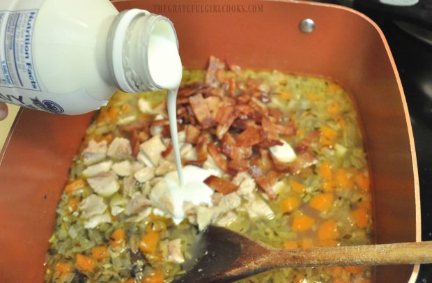 Heavy whipping cream is added to the chicken wild rice soup.
