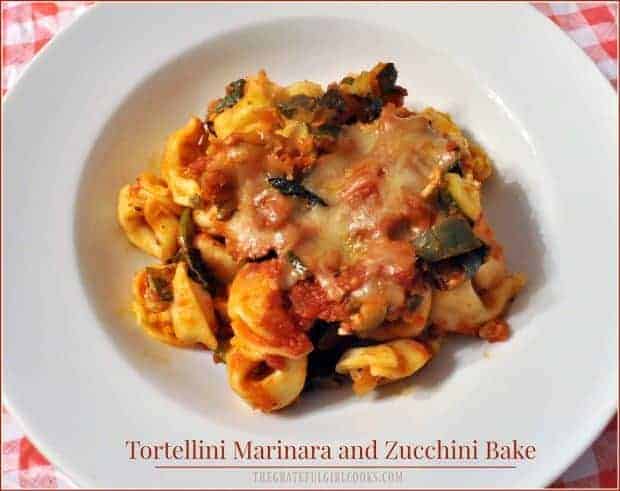 Enjoy Tortellini Marinara Zucchini Bake (Wt. Watchers), a meatless casserole, with cheese tortellini, sauce, zucchini, spinach, & mozzarella!