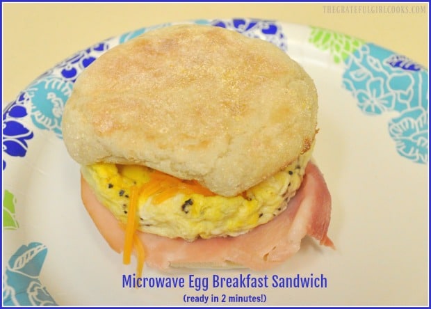 Need breakfast quick? Try this 2 minute microwave egg breakfast sandwich, prepared in a microwave, with egg, ham and cheese on a toasted English muffin!