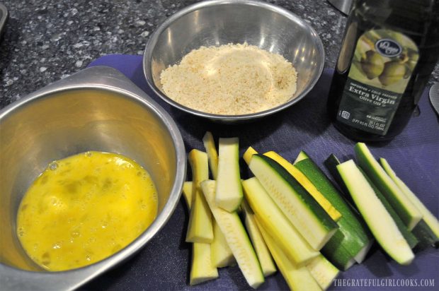 Beaten eggs, and panko bread crumbs are needed to coat zucchini fries before baking.