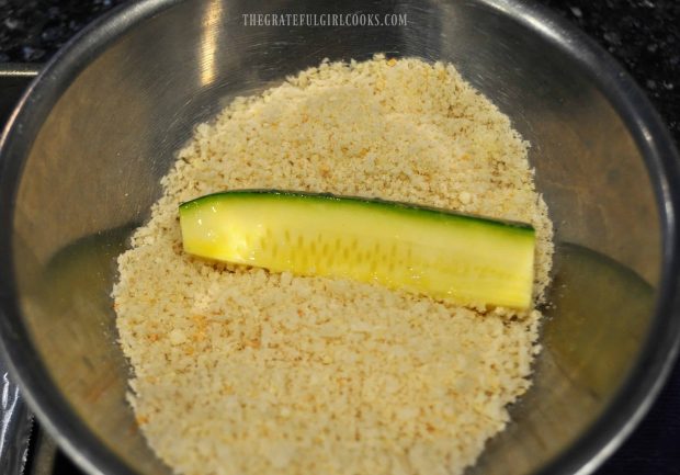 Zucchini fries are coated with panko breadcrumbs before baking.