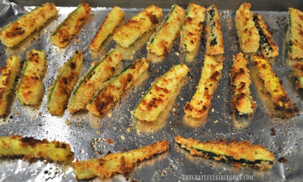Baked Parmesan Zucchini Fries are golden brown and crispy after baking.