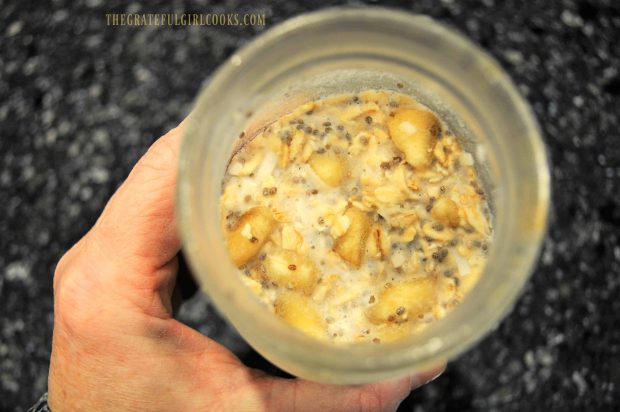 Overnight Banana Coconut Oats have thickened after refrigerating overnight.