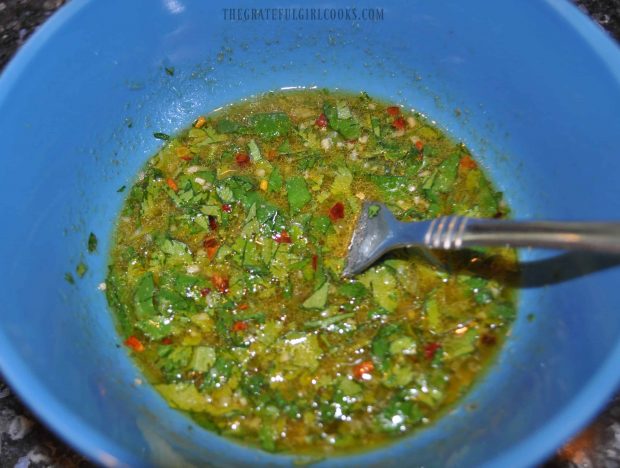 Ingredients for the chicken marinade are combined in a bowl.