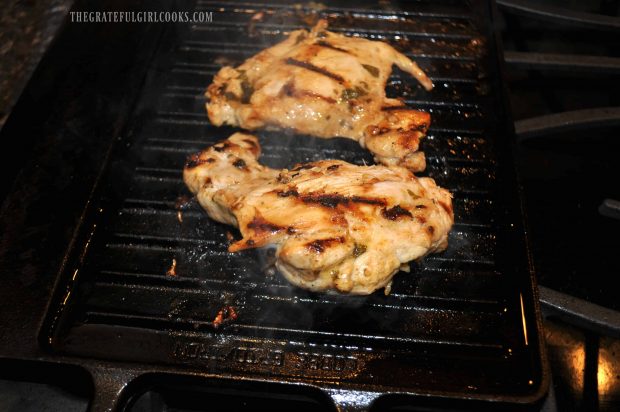 The chicken pieces are fully cooked before slicing and adding to the salad.