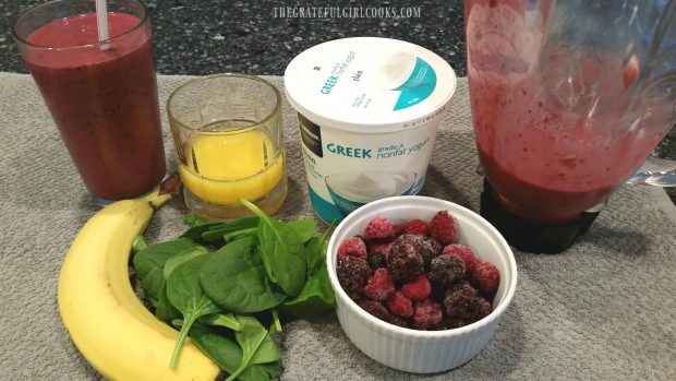 All the ingredients used to make a triple berry banana smoothie!