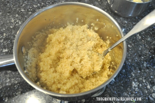 Cooked quinoa in metal saucepan