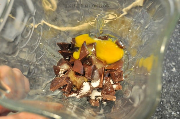 Mixing chocolates and egg in blender