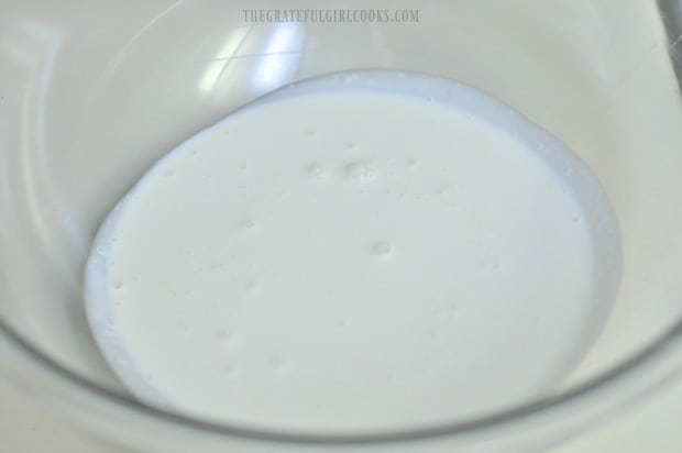 Whipping cream in large bowl