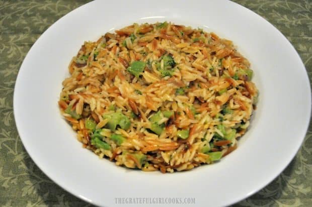 Broccoli au gratin rice pilaf in white bowl