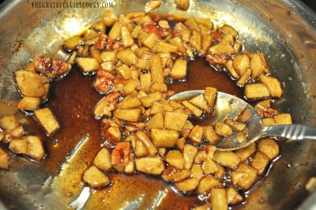 Apples, pecans, cinnamon and brown sugar, in skillet