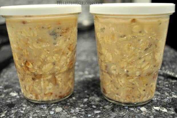Two covered jars with overnight oats inside