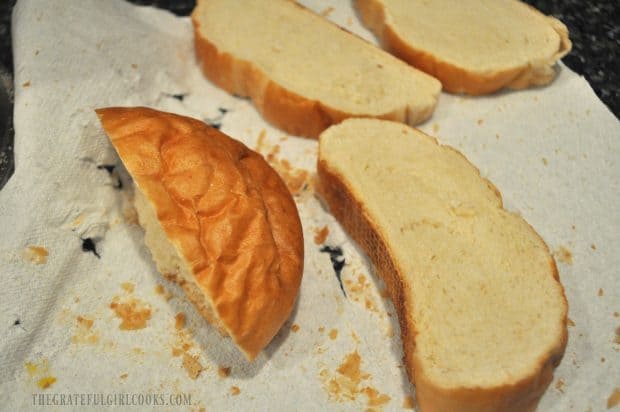 4 slices of French bread drying on paper towel