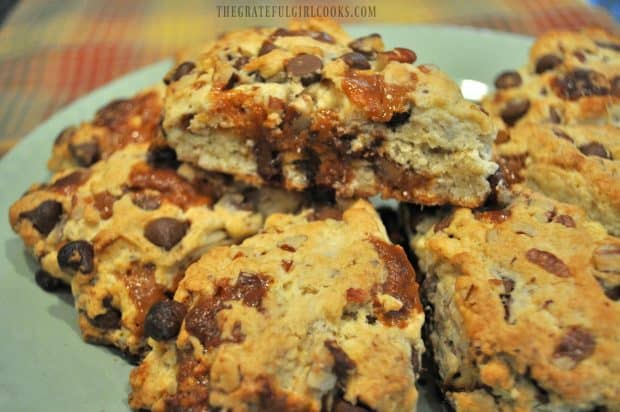 Baked scones, with one sitting on top