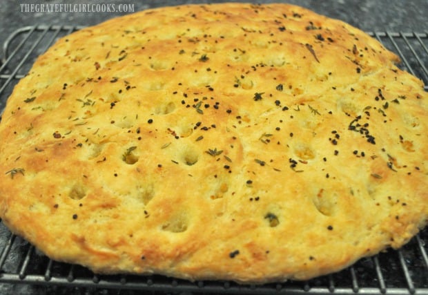 Baked garlic focaccia bread, cooling on wire rack