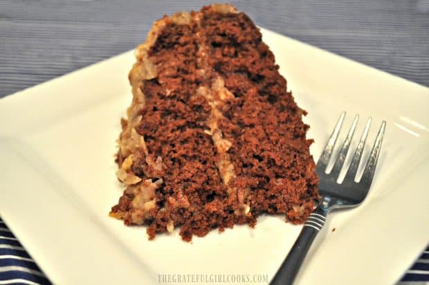 Easy German chocolate cake with homemade frosting on white plate