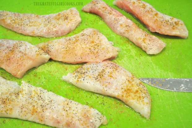 Seasoned pieces of fish to grill for tacos