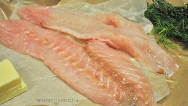 Raw rockfish fillets with butter and herbs