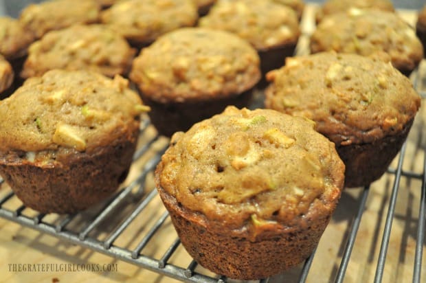 Close up photo of muffins with apples, raisins, and pecans