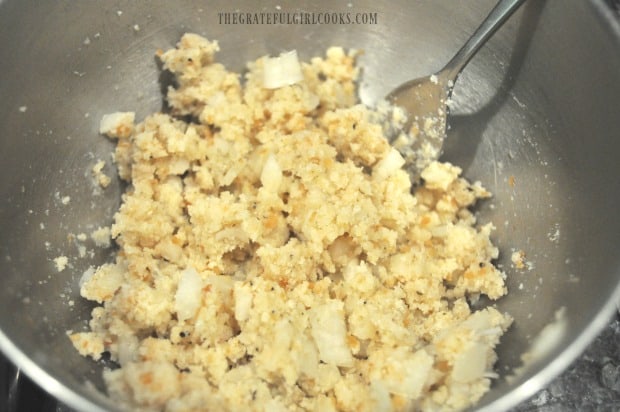 Bread crumb, onions and spices for beef roll stuffing, in bowl