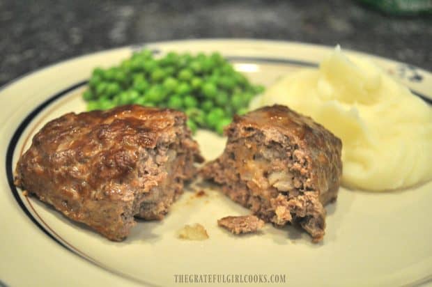 One of the stuffed beef rolls, cut in half to show inside.