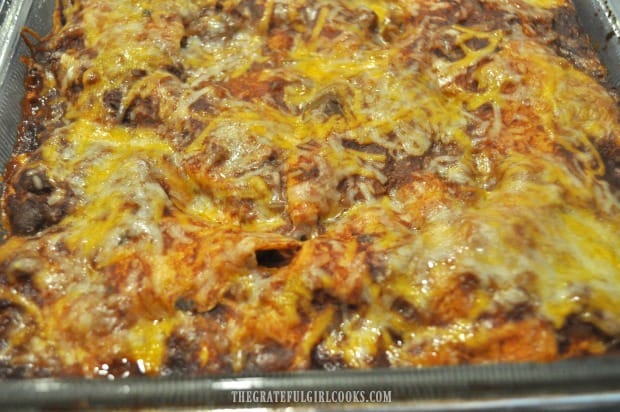 Melted cheese on top of chicken enchilada casserole