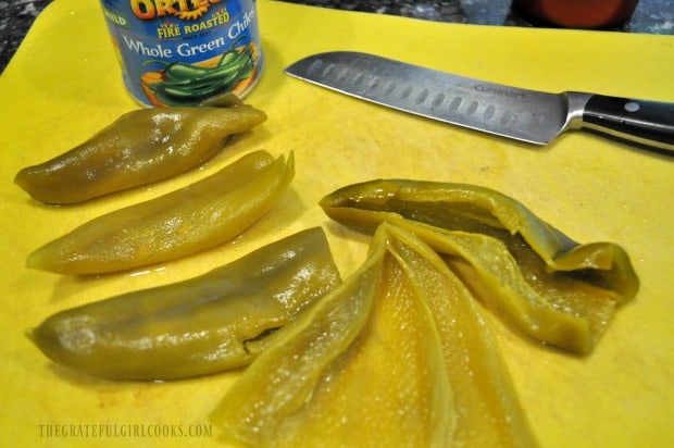 Slicing and cleaning whole green chiles for casserole