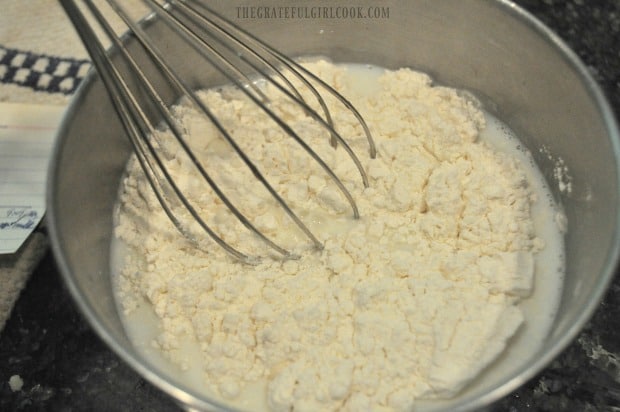 Mixing flour, milk and salt for casserole