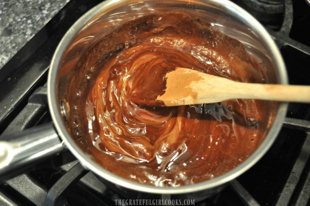 Chocolate peanut butter frosting cooking in saucepan