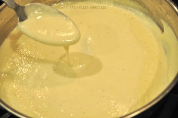 Alfredo sauce has thickened to the perfect consistency