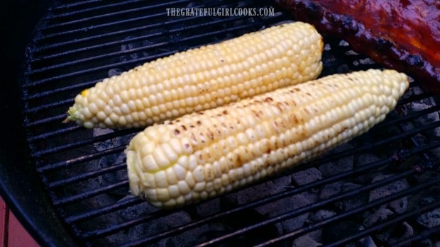 Corn is rotated on grill a quarter turn every 2-3 minutes