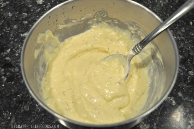 Ingredients for tuna pasta salad are mixed together in small bowl