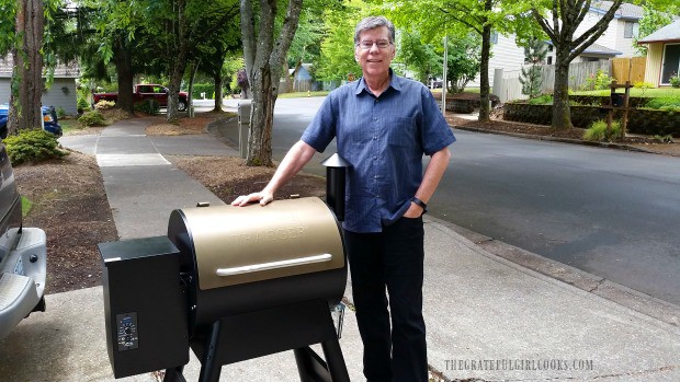 My husband, with his new Traeger grill.