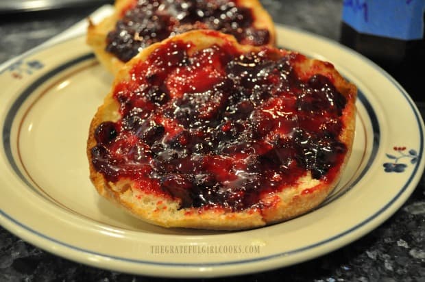 Yummy boysenberry jam spread onto english muffins.