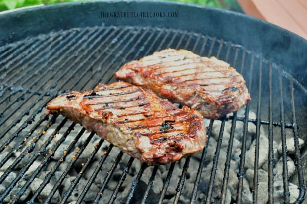 Cooking rib eye steaks on our Weber grill