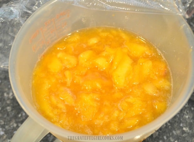Part of the peaches are set aside and chilled before adding to ice cream.