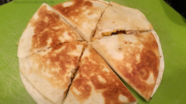 Each chicken black bean quesadilla half is sliced into three pieces.