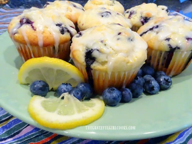 Blueberry lemon muffins are drizzled with lemon glaze and are ready to eat!